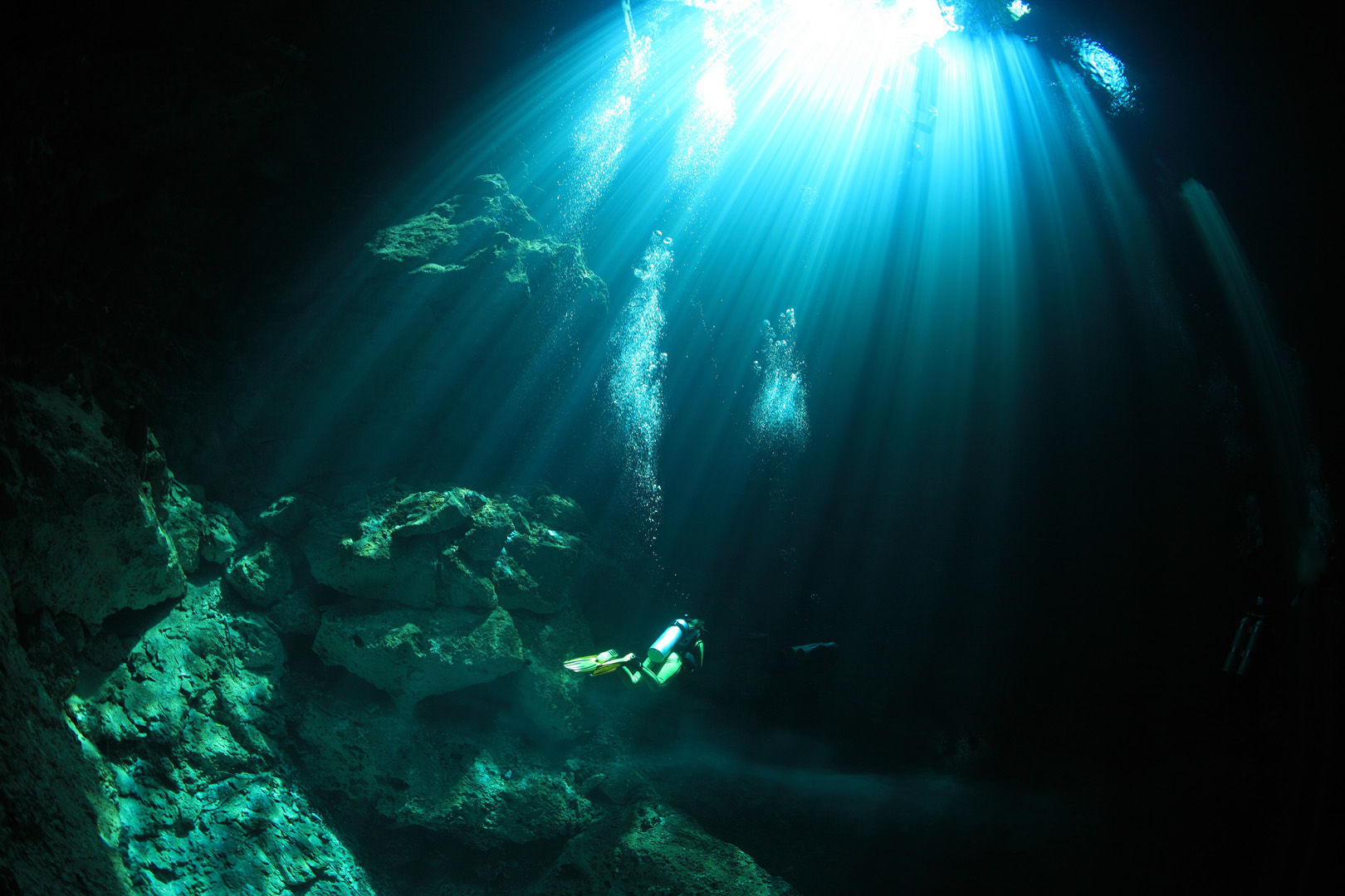 Very different adventures await those who explore one of the many clear fresh water cenotes with their caverns and caves that riddle Mexico's Yucatan Peninsula Very different adventures await those who explore one of the many clear fresh water cenotes with their caverns and caves that riddle Mexico's Yucatan Peninsula