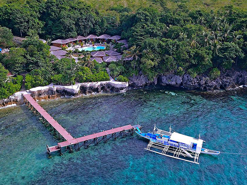 The Magic Oceans Dive Resort sits at the tip of a peninsula on the island of Bohol.